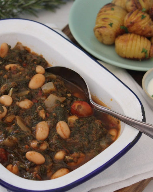 SMOKY BUTTERBEAN & SPINACH STEW WITH HASSLEBACK POTATOES